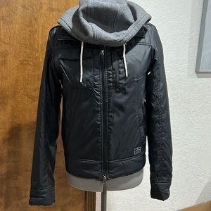 Nike XS (0-1) black woven jacket with attached grey sweatshirt material hoodie.